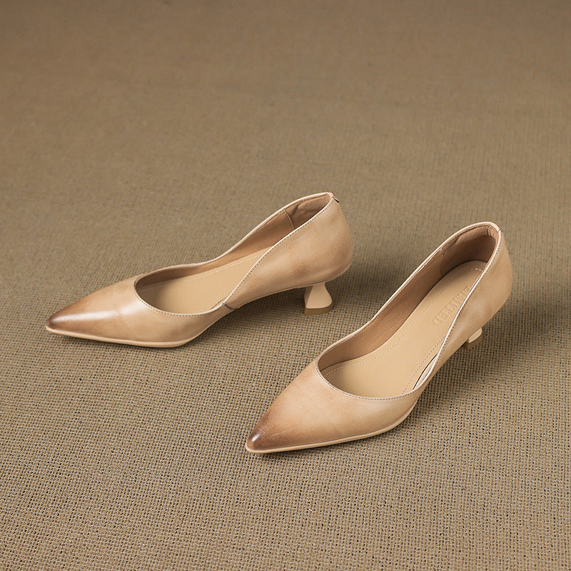 Calenne Leather Kitten Heels" can be rephrased as "Calenne Elegant Leather Kitten Heels.
