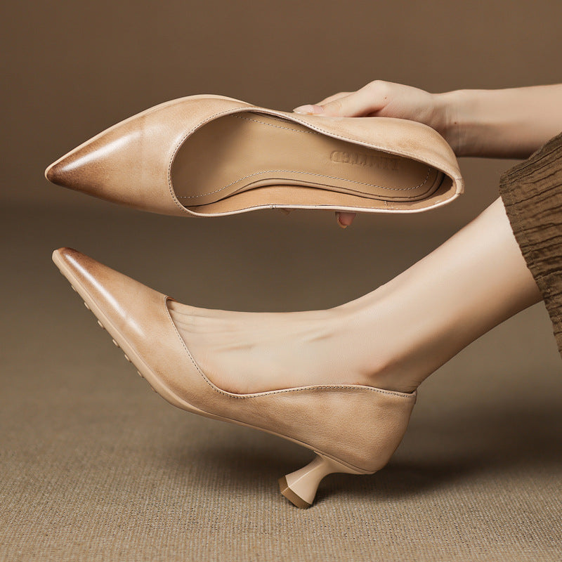 Calenne Leather Kitten Heels" can be rephrased as "Calenne Elegant Leather Kitten Heels.