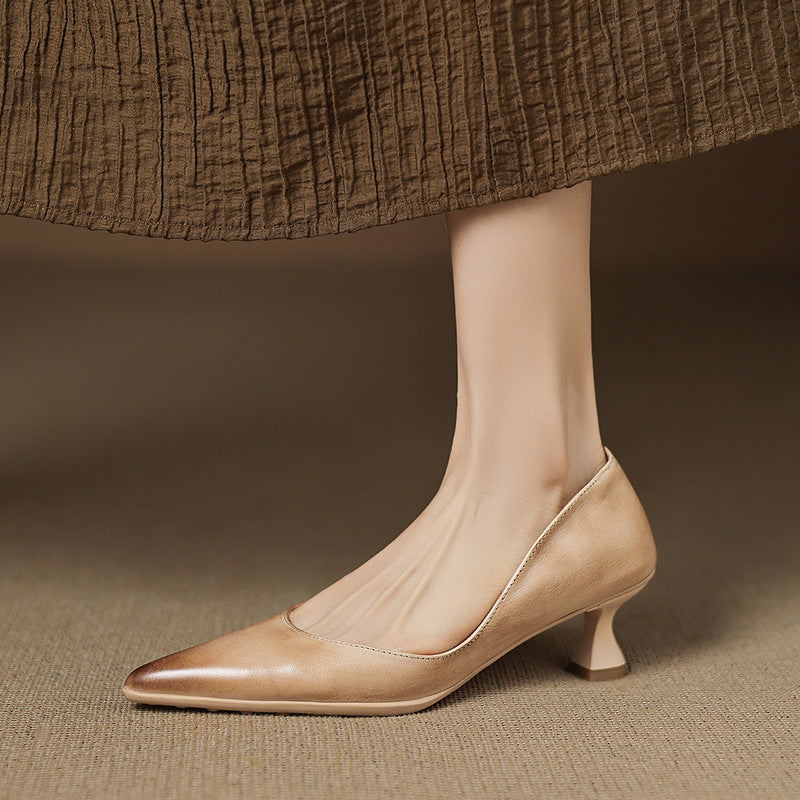 Calenne Leather Kitten Heels" can be rephrased as "Calenne Elegant Leather Kitten Heels.