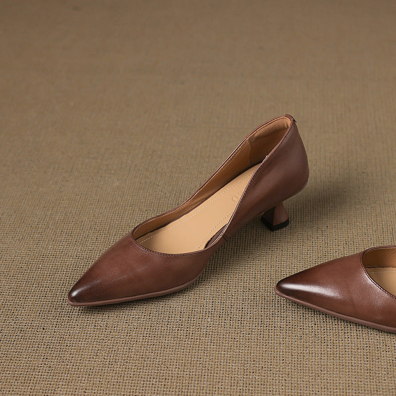 Calenne Leather Kitten Heels" can be rephrased as "Calenne Elegant Leather Kitten Heels.