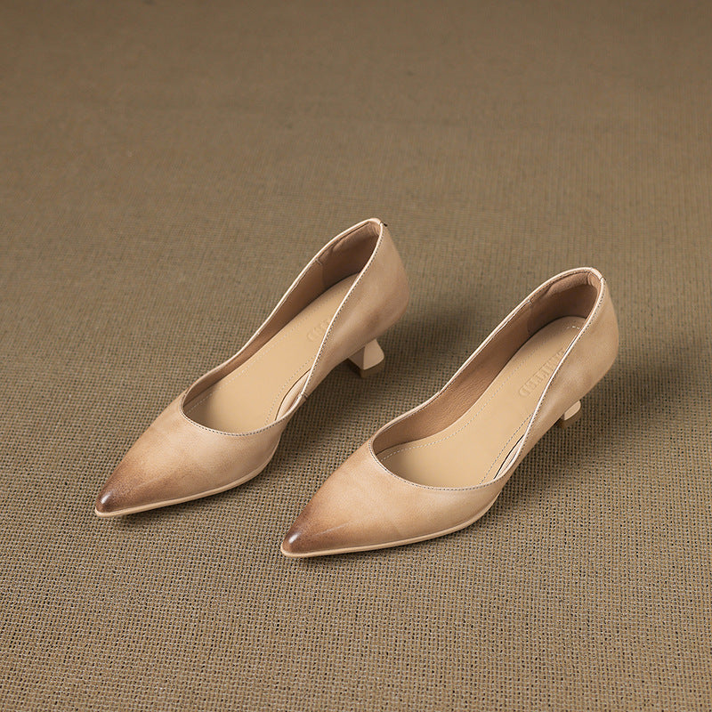 Calenne Leather Kitten Heels" can be rephrased as "Calenne Elegant Leather Kitten Heels.
