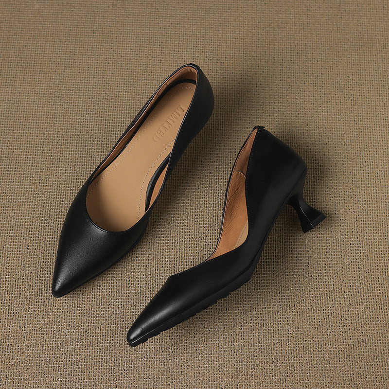Calenne Leather Kitten Heels" can be rephrased as "Calenne Elegant Leather Kitten Heels.