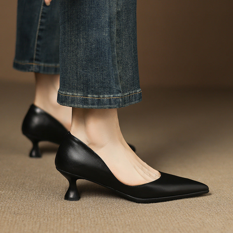 Calenne Leather Kitten Heels" can be rephrased as "Calenne Elegant Leather Kitten Heels.
