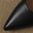 Calenne Leather Kitten Heels" can be rephrased as "Calenne Elegant Leather Kitten Heels.