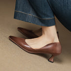 Calenne Leather Kitten Heels" can be rephrased as "Calenne Elegant Leather Kitten Heels.