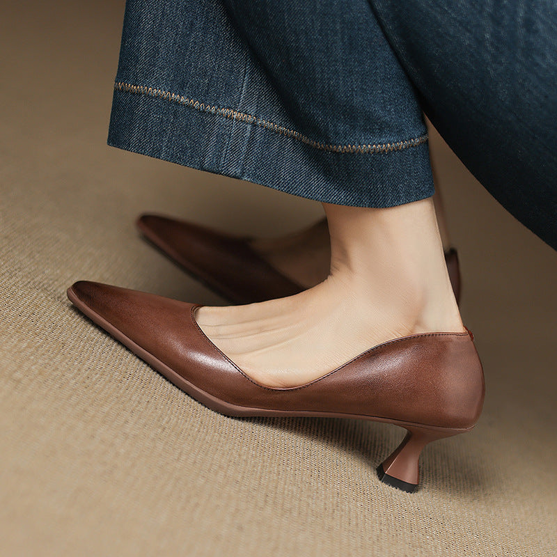 Calenne Leather Kitten Heels" can be rephrased as "Calenne Elegant Leather Kitten Heels.