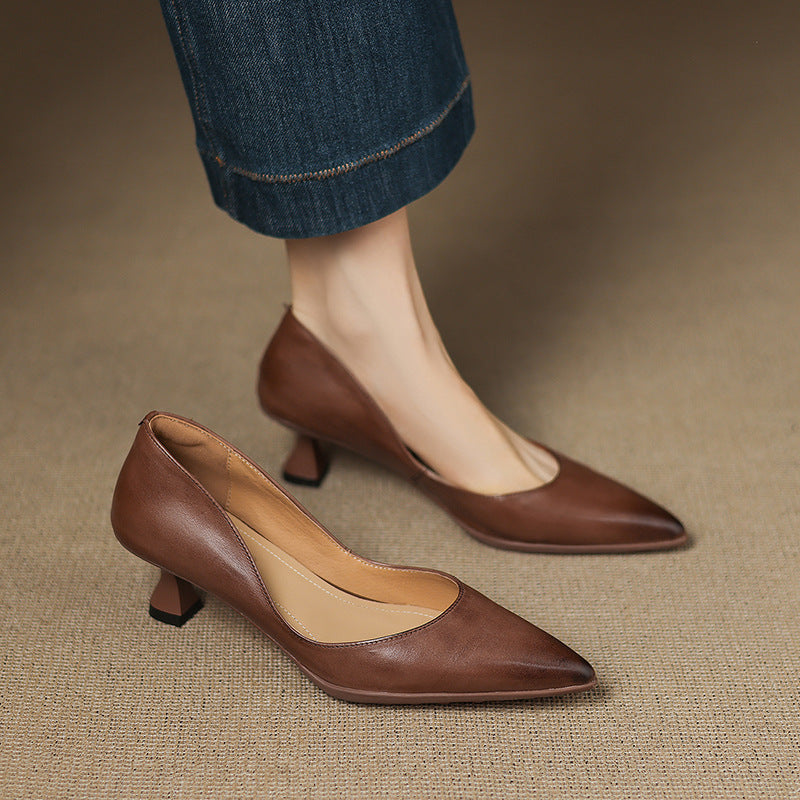 Calenne Leather Kitten Heels" can be rephrased as "Calenne Elegant Leather Kitten Heels.