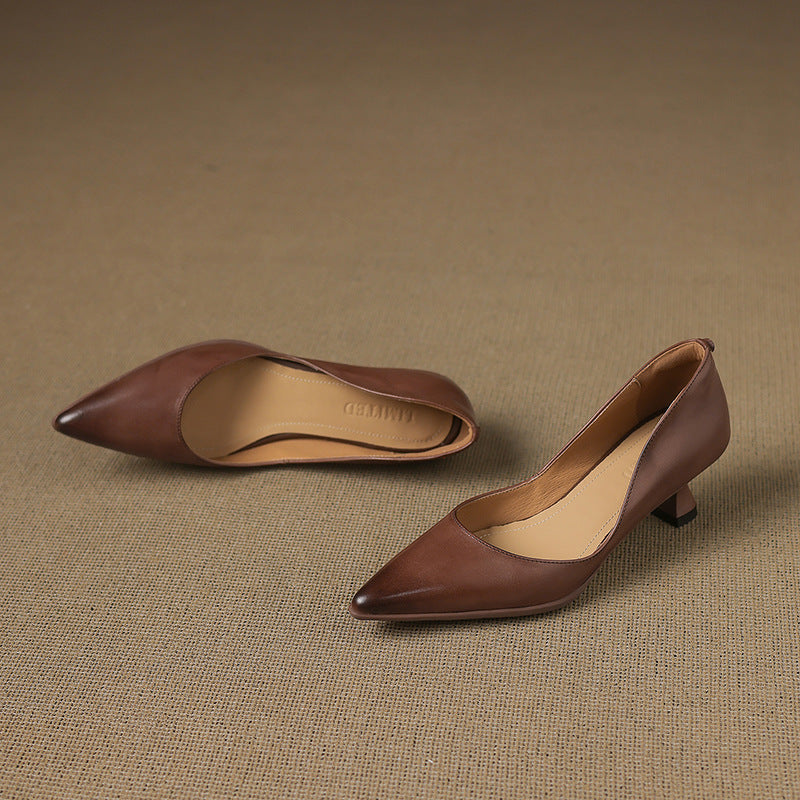 Calenne Leather Kitten Heels" can be rephrased as "Calenne Elegant Leather Kitten Heels.