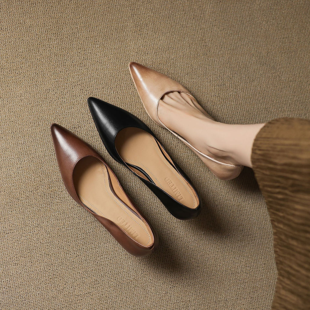 Calenne Leather Kitten Heels" can be rephrased as "Calenne Elegant Leather Kitten Heels.