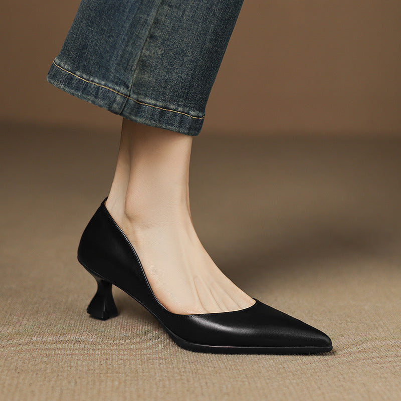 Calenne Leather Kitten Heels" can be rephrased as "Calenne Elegant Leather Kitten Heels.