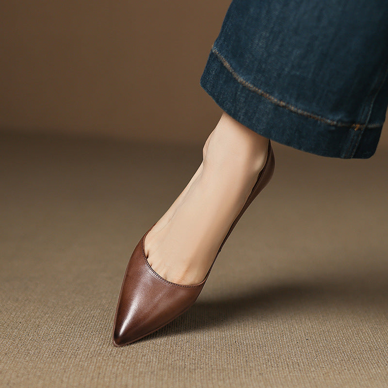 Calenne Leather Kitten Heels" can be rephrased as "Calenne Elegant Leather Kitten Heels.
