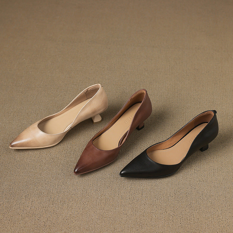 Calenne Leather Kitten Heels" can be rephrased as "Calenne Elegant Leather Kitten Heels.