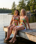Swimwear with Sunprotective Sarong Tropical Coral, lifestyle seated at water edge